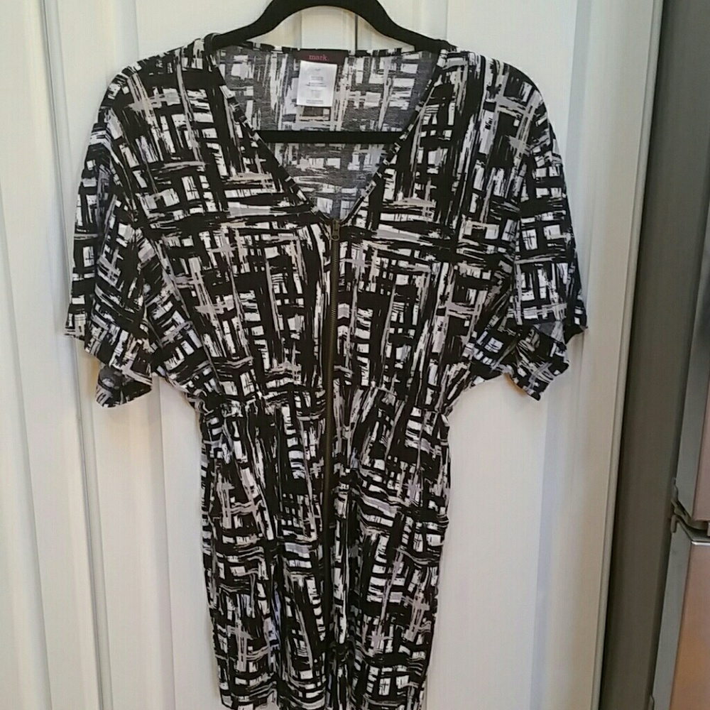 MARK.  Dress with full length zippered front.